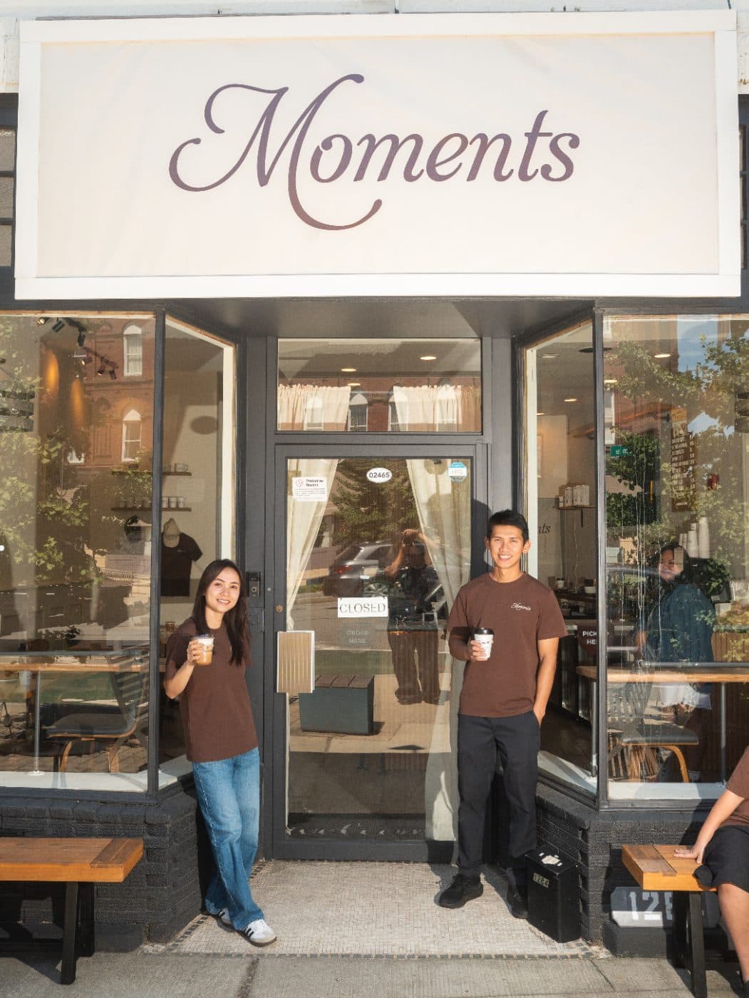 The Moments team outside the storefront on Washington Street